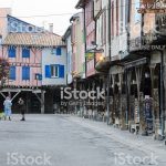 Mirepoix, France - April 8, 2014: Wooden arcaded streets of the French medieval village of Mirepoix.